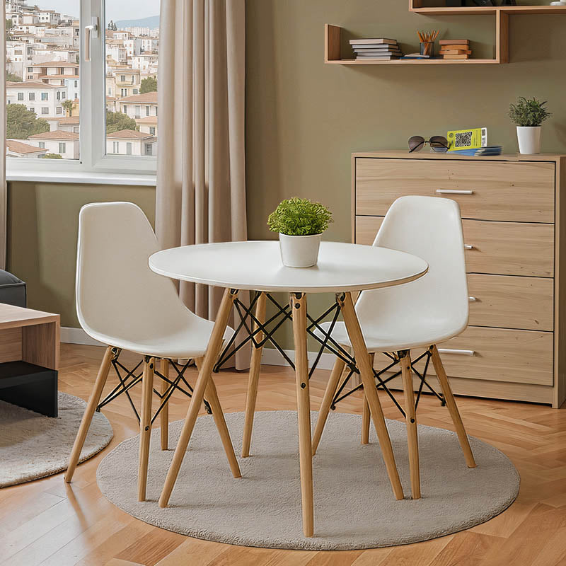 Модерен минималистички трпезариски сет Dining Room Set со тркалезна бела маса врз стабилна база и две ергономски бели Vedaar лоунџ столици во скандинавски стил