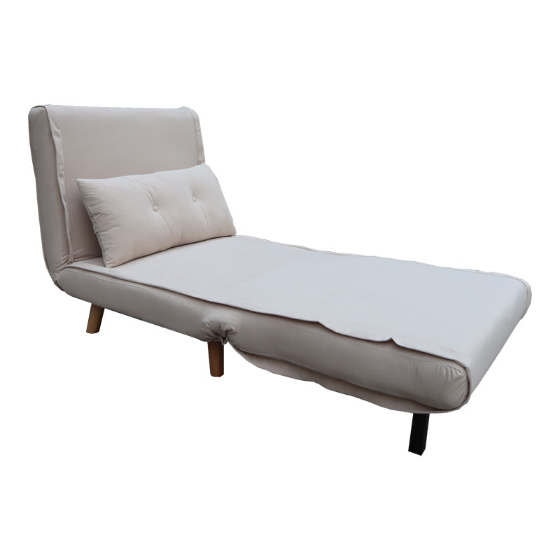 Модерна мултифункционална фотелја на расклопување Armchair-Bed Wreax обложена со луксузно крем кадифе, поддржана со цврсти дрвени ногарки во природна натур нијанса